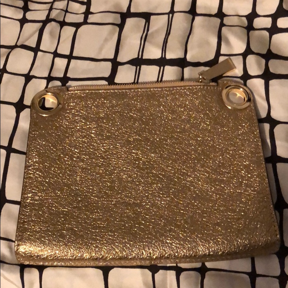 Michael Kors gold clutch